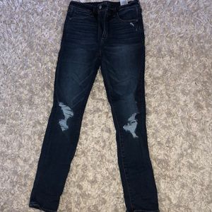 High waisted distressed jeans